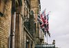 The Romans อังกฤษยุคโรมัน hanged flags beside building