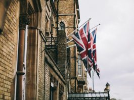 hanged flags beside building